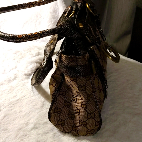 Brown and Tan shoulder bag with multiple zippered pockets - Picture 3 of 11